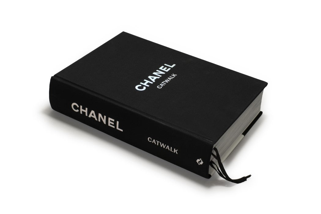 Chanel Catwalk hardback in black with white lettering, angled view
