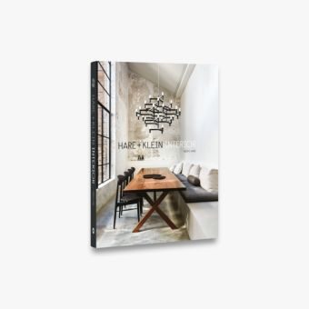 A HARE + KLEIN INTERIOR | Meryl Hare book with an image of a table and chairs.