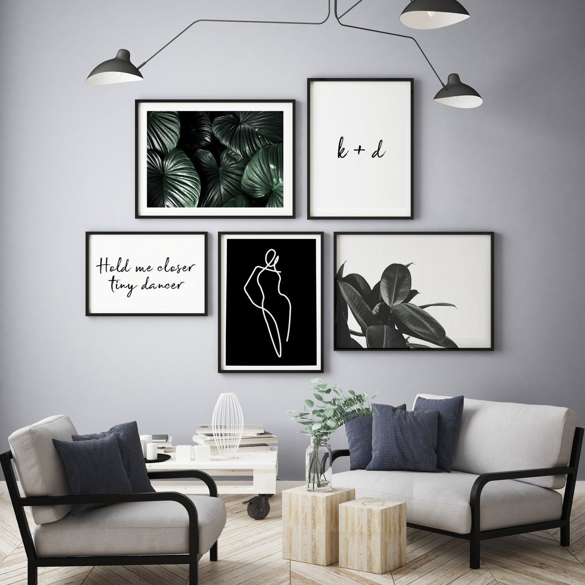 Branch Out print in a gallery wall above two armchairs and a coffee table
