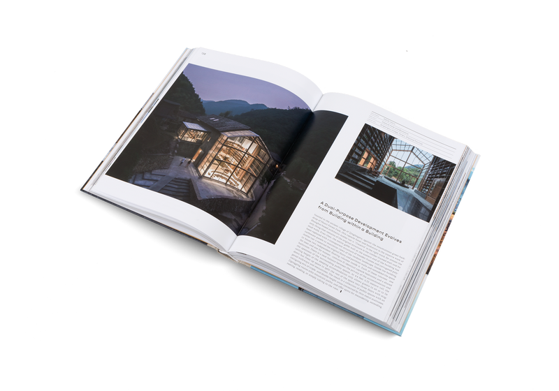 An open book showcasing a stunning photograph of a house, perfect for architects and anyone interested in Chinese architecture; the BEAUTY AND THE EAST book by Books.