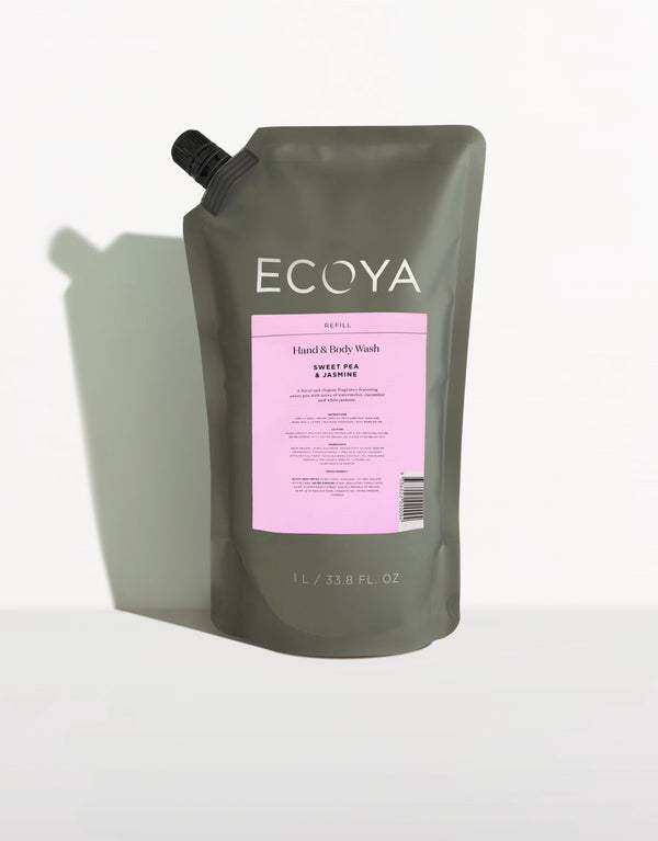 Ecoya Hand And Body Wash Refill in a stylish pink bag on a clean white surface, perfect for Scandinavian design enthusiasts.