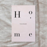 A book cover designed by the Australian Graphic Design Association featuring the word Home | Victoria Alexander.