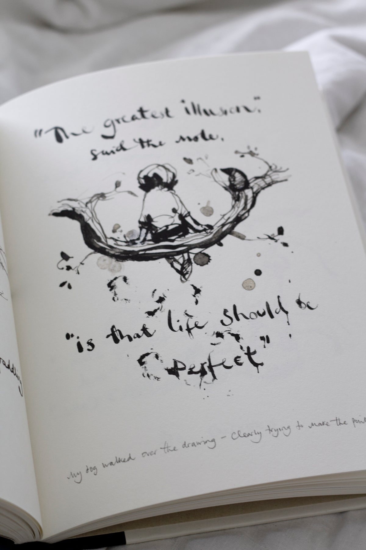 An open Charlie Mackesy | The Boy, The Mole, The Fox and The Horse book.