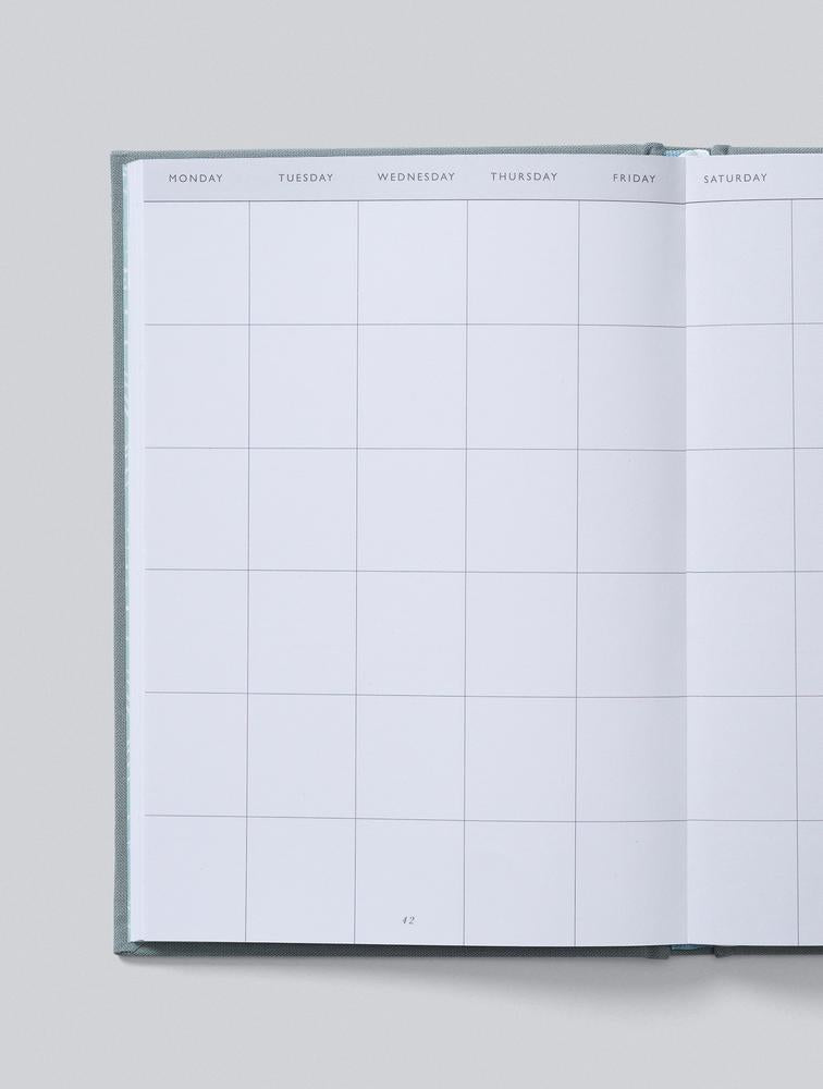 Open journal showing a treatment calendar grid