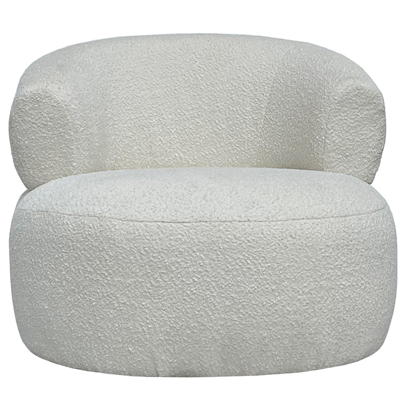 Barberra armchair face on, the boucle back curving around both sides of the seat