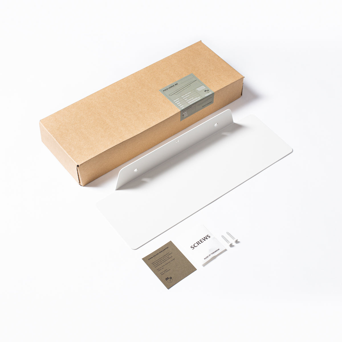 A white box with a FOLD Ledge 900mm ∙ Black and a bathroom.