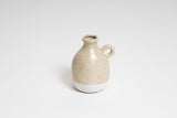 A beige and white Charlie vase from the Ned Collections range.