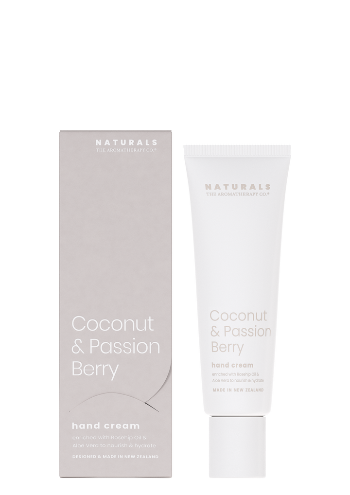 Naturals Coconut & Passion Berry hand cream tube beside its soft grey box on white