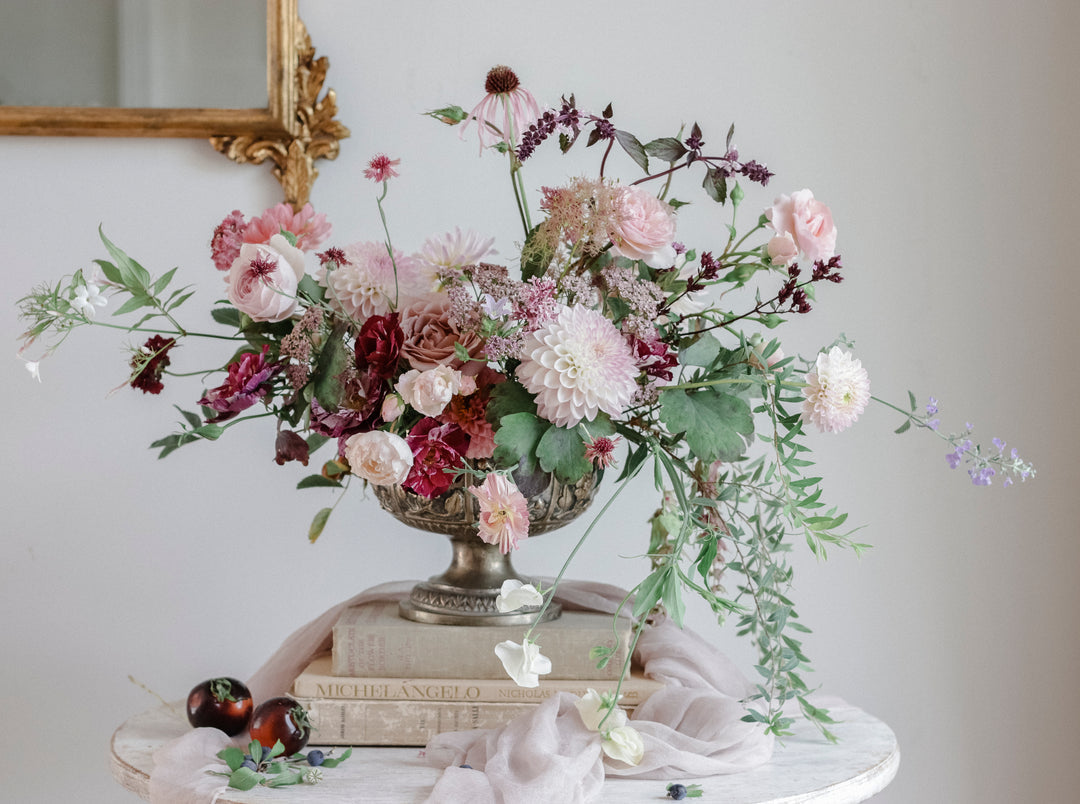 The Flower Hunter page spread showing a still life floral arrangement