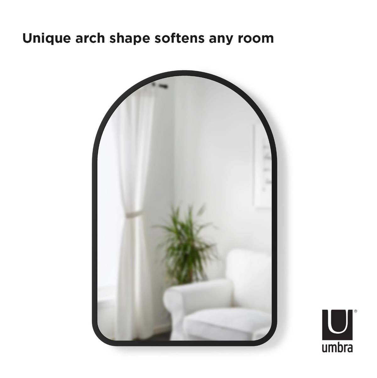 Close-up of the Umbra Hub arched mirror black rubber rim