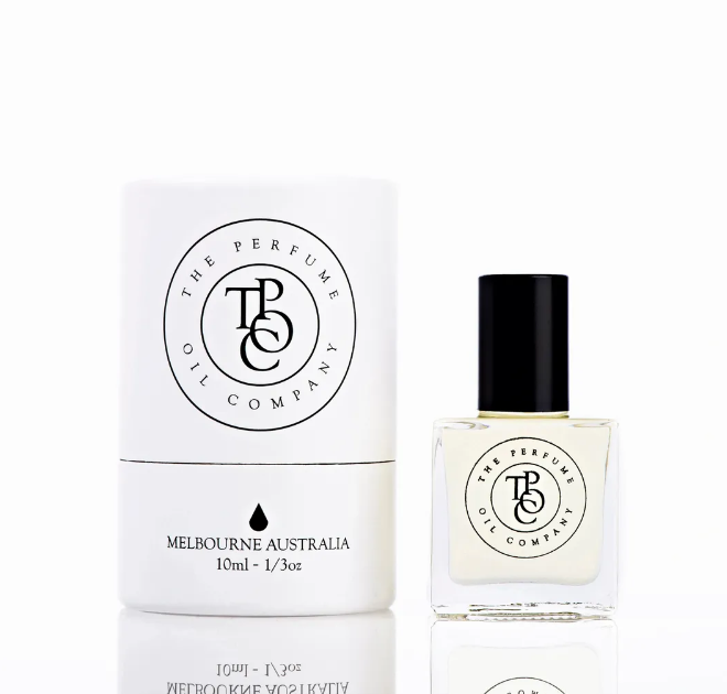 The Perfume Oil Company 10ml roll-on bottle beside its white gift box