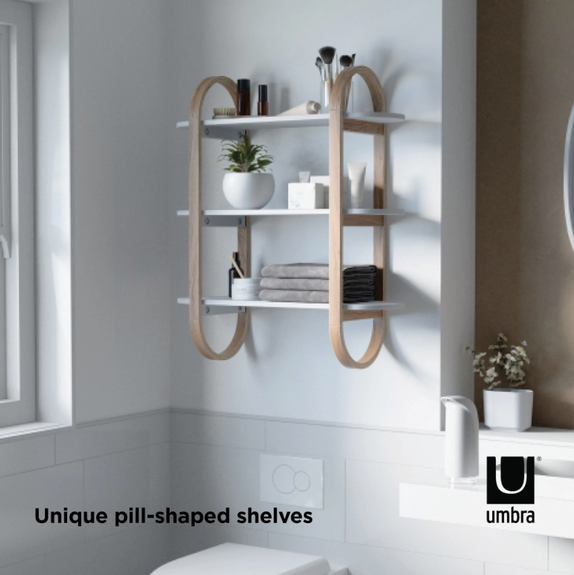 Umbra Bellwood three tier wall shelf in natural on a bathroom wall, pill-shaped frame