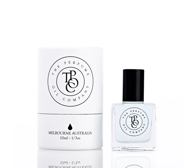 The Perfume Oil Company 10ml roll-on bottle beside its white cylindrical gift tube