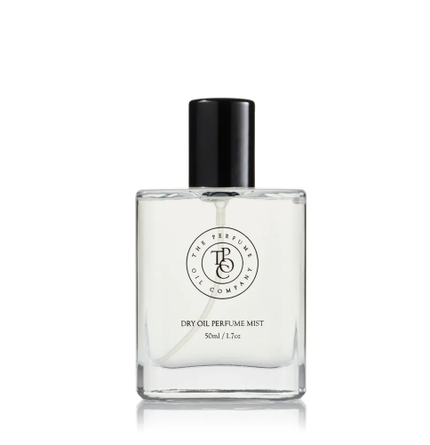 A bottle of NUDE, inspired by Beige (CC) cologne from The Perfume Oil Company on a white background.