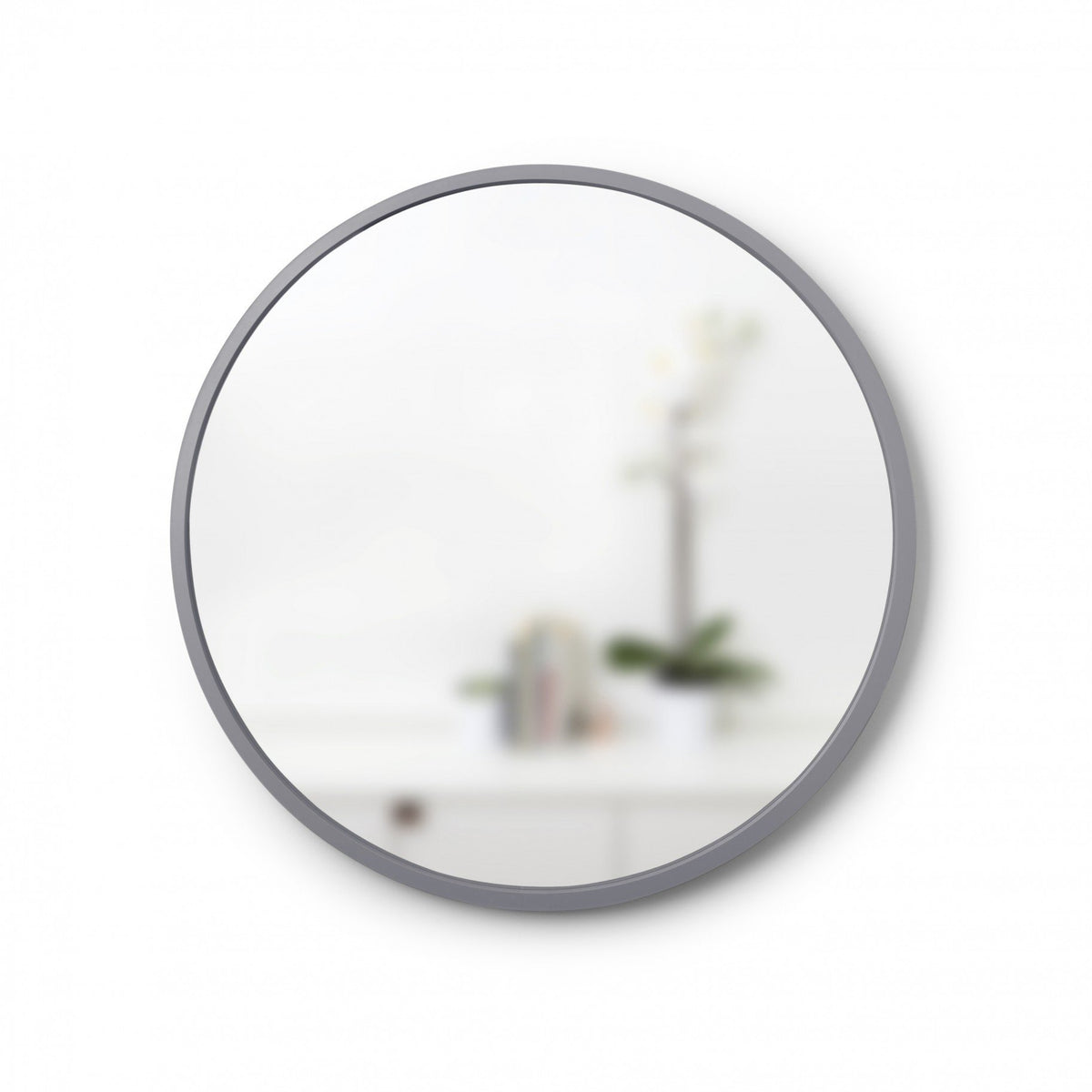Umbra Hub grey 94cm round mirror with rubber frame on wall