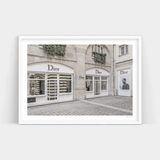 A black and white photo of an Art Prints Storefront in Paris.