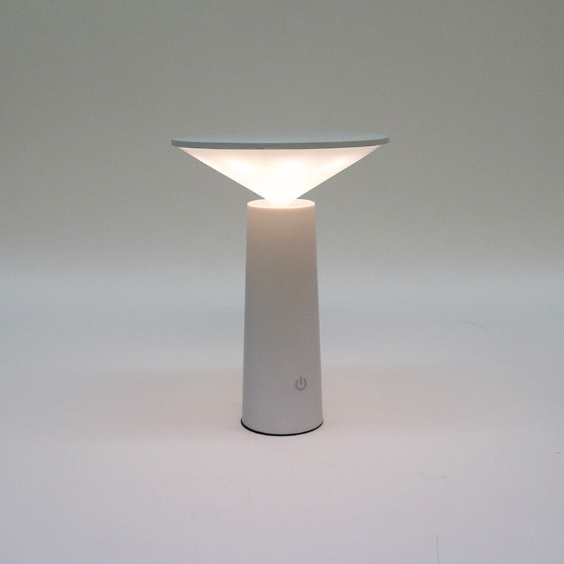 White LED Tilt lamp lit with the shade angled to throw light forward