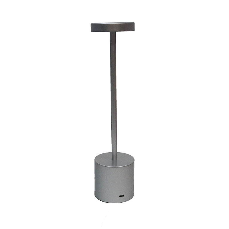 Silver Skyscraper LED lamp with a slim stem and round shade, shown unlit on a white background