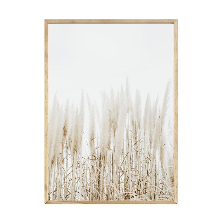 Pampas print in a natural timber frame