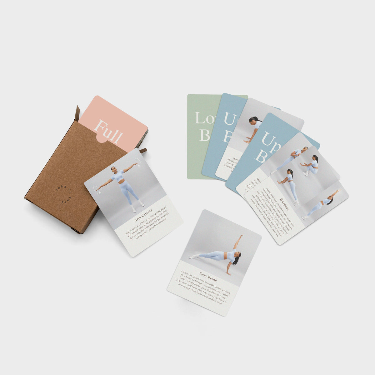 Body Work exercise cards fanned out beside the box