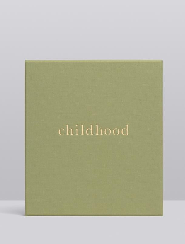 Childhood Memories Journal in sage linen standing upright against a soft grey background