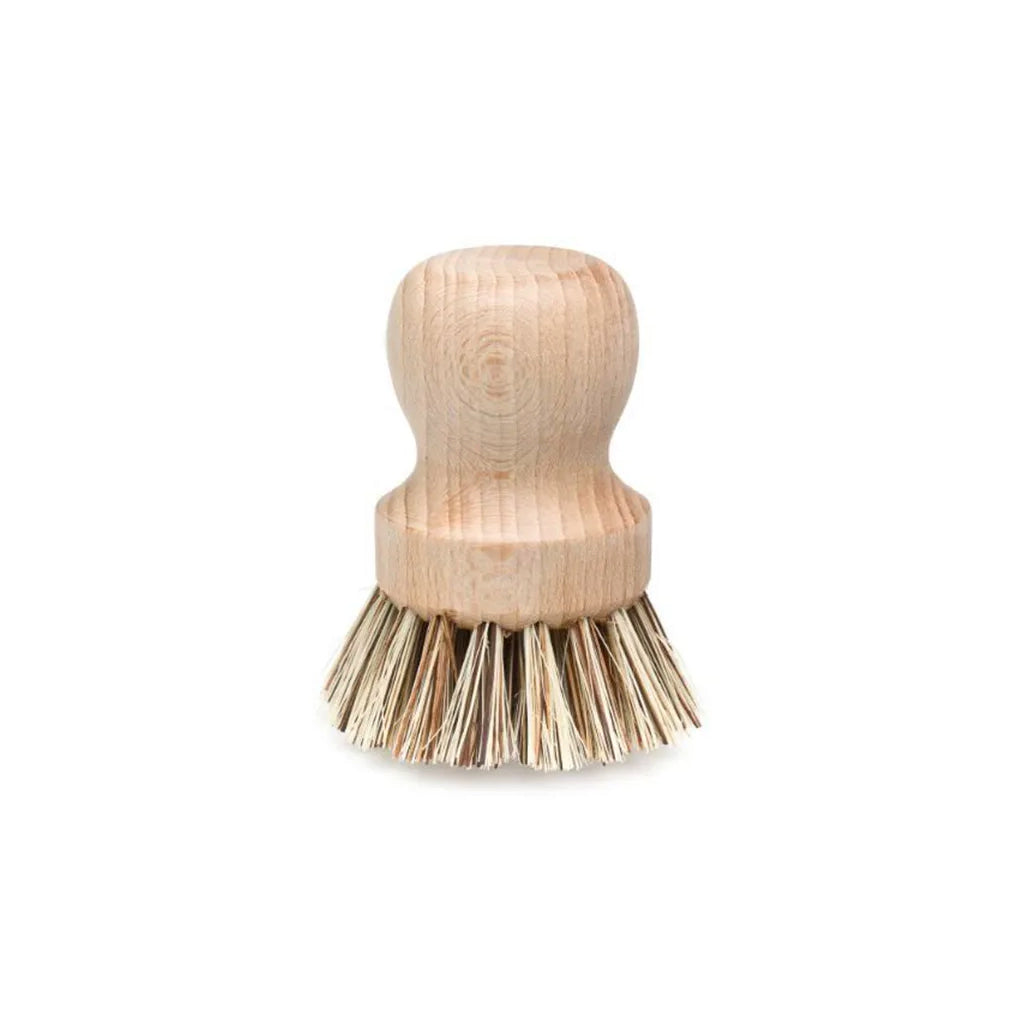 Pot brush with a round beechwood handle and natural bristles, on white