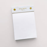 A limited edition white Daily Notes notepad embellished with gold studs, perfect for all your stationery needs by Papier HQ.