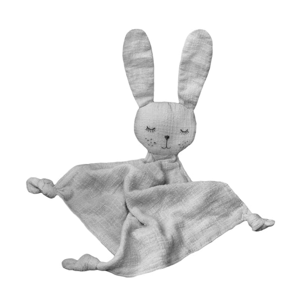 A Grey the Bunny Comforter by Lily & George lying on a fabric surface.
