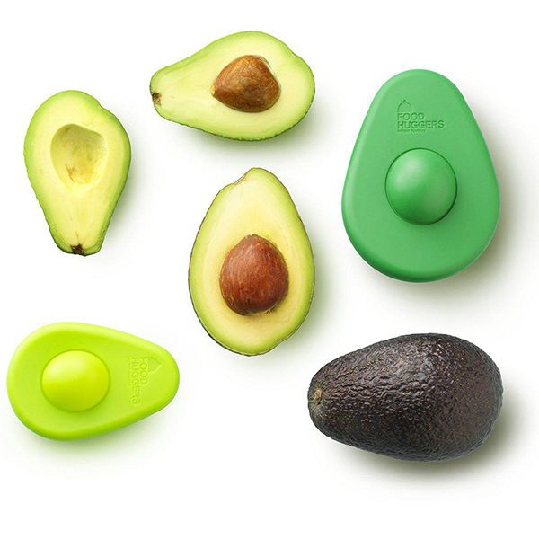 A group of fresh green SET OF 2 - AVO SAVERS on a white surface.