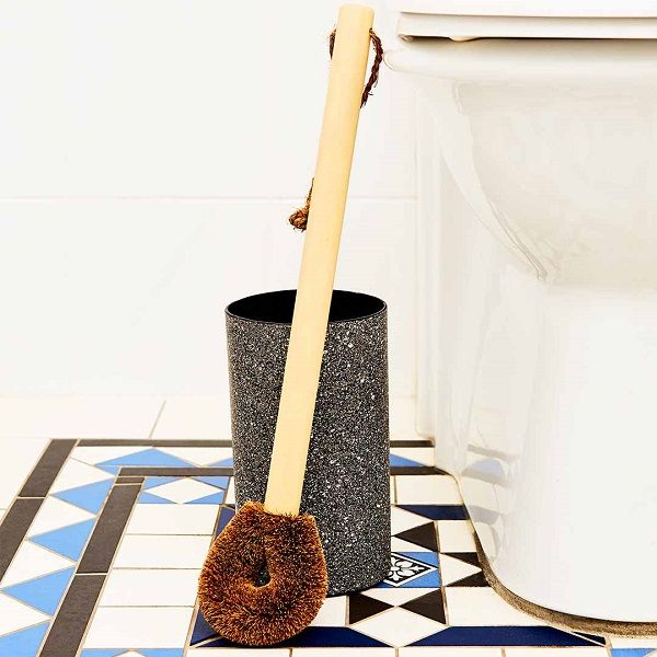 A DALBY BLACK GRANITE TOILET BRUSH HOLDER by Ecomax sitting on a tiled floor.