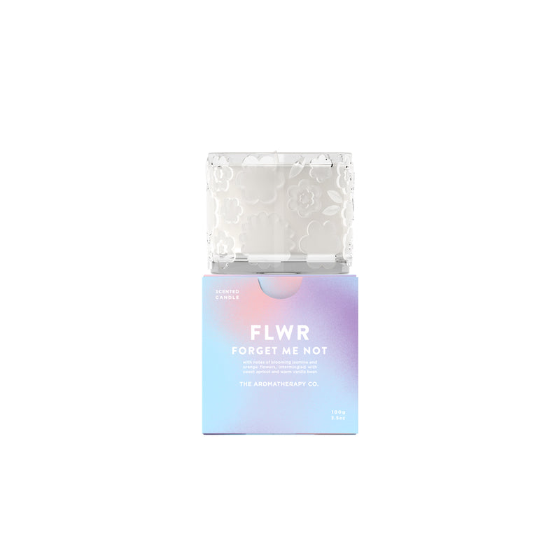 A box of FLWR Candle - FORGET ME NOT face masks on a white background, scented with blooming jasmine and sweet apricot, by The Aromatherapy Co.
