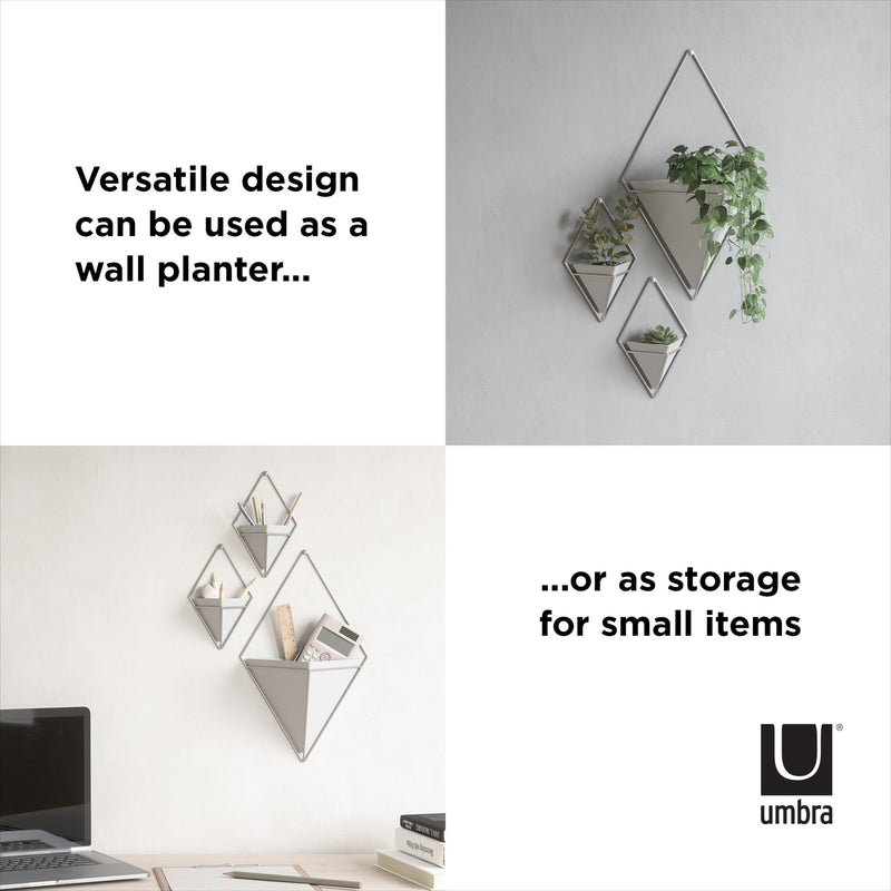 Versatile design can be used as a storage for small items or indoor plants. The modern design of Umbra Trigg Wall Vessel | Small Set of Two enhances any space it is placed in.