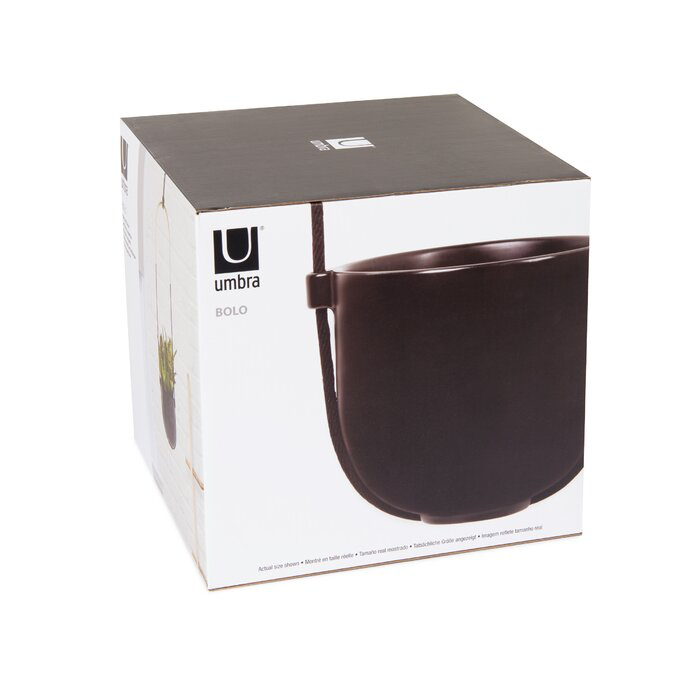 A black hanging Bolo Planter from the Umbra range in a box.