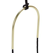 A gold and black rope hanging from an Umbra Bolo Planter - Black cord.
