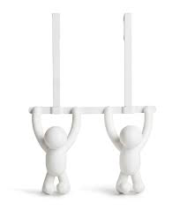 Umbra Buddy over-the-door double hook in white against a white wall