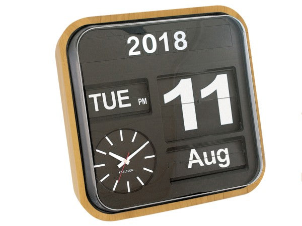 Karlsson flip calendar clock with analogue face showing day, date and month
