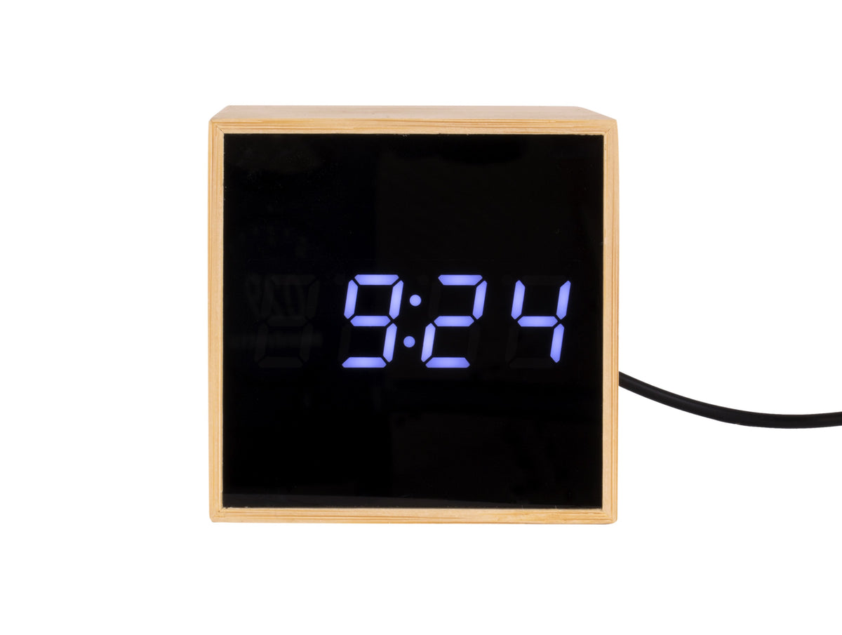 Aesthetically pleasing Karlsson Alarm Mini Cube clock with blue LED lights.