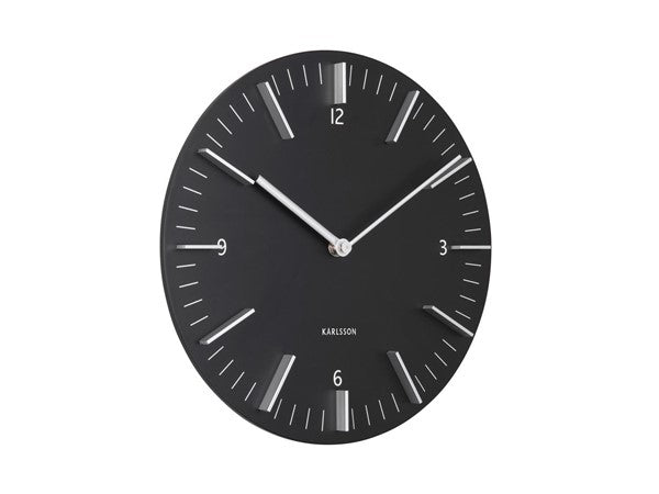 Detailed wall clock in black, angled view