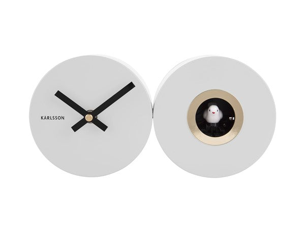 A white open face Duo Cuckoo clock by Karlsson with a bird on it.
