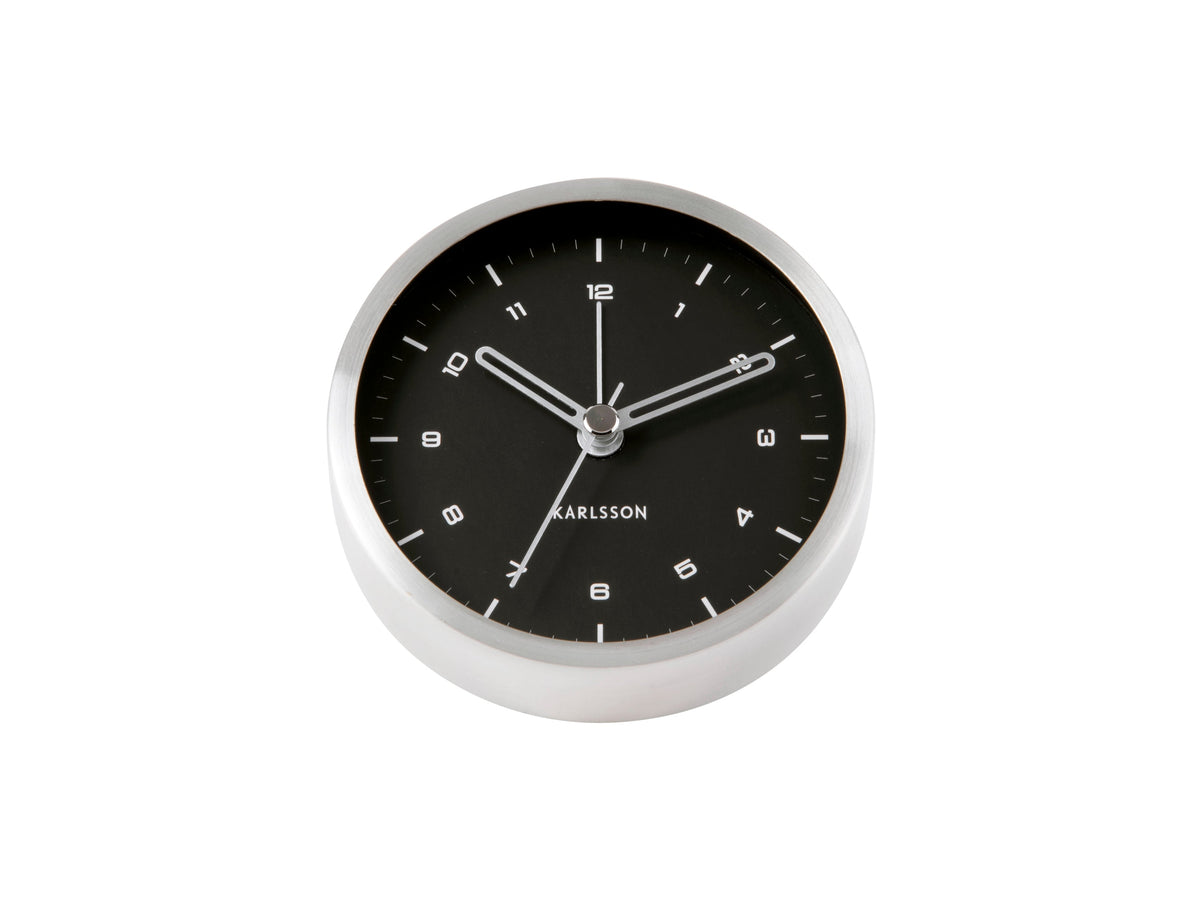 Karlsson Tinge Alarm Clock with brushed steel rim in black, angled view