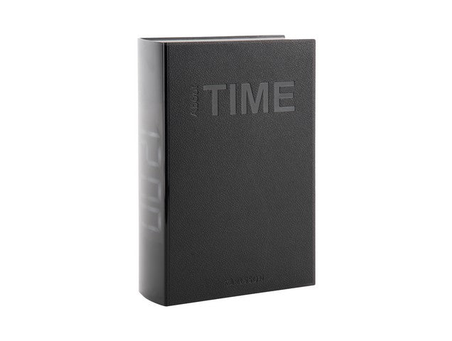 Karlsson Alarm LED Book Clock styled on a shelf among books