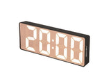 A minimalistic Scandinavian clock, the Karlsson Alarm Mirror LED in black numbers.