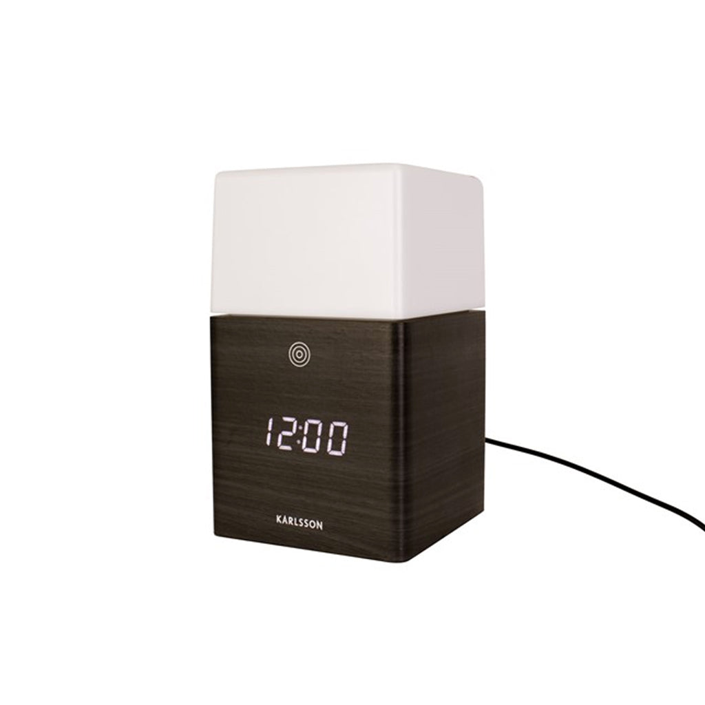 Karlsson Frost Light Alarm Clock in wood, on a white background