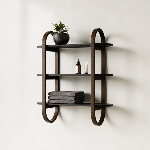 Umbra Bellwood three tier wall shelf in walnut and black holding a plant and towels