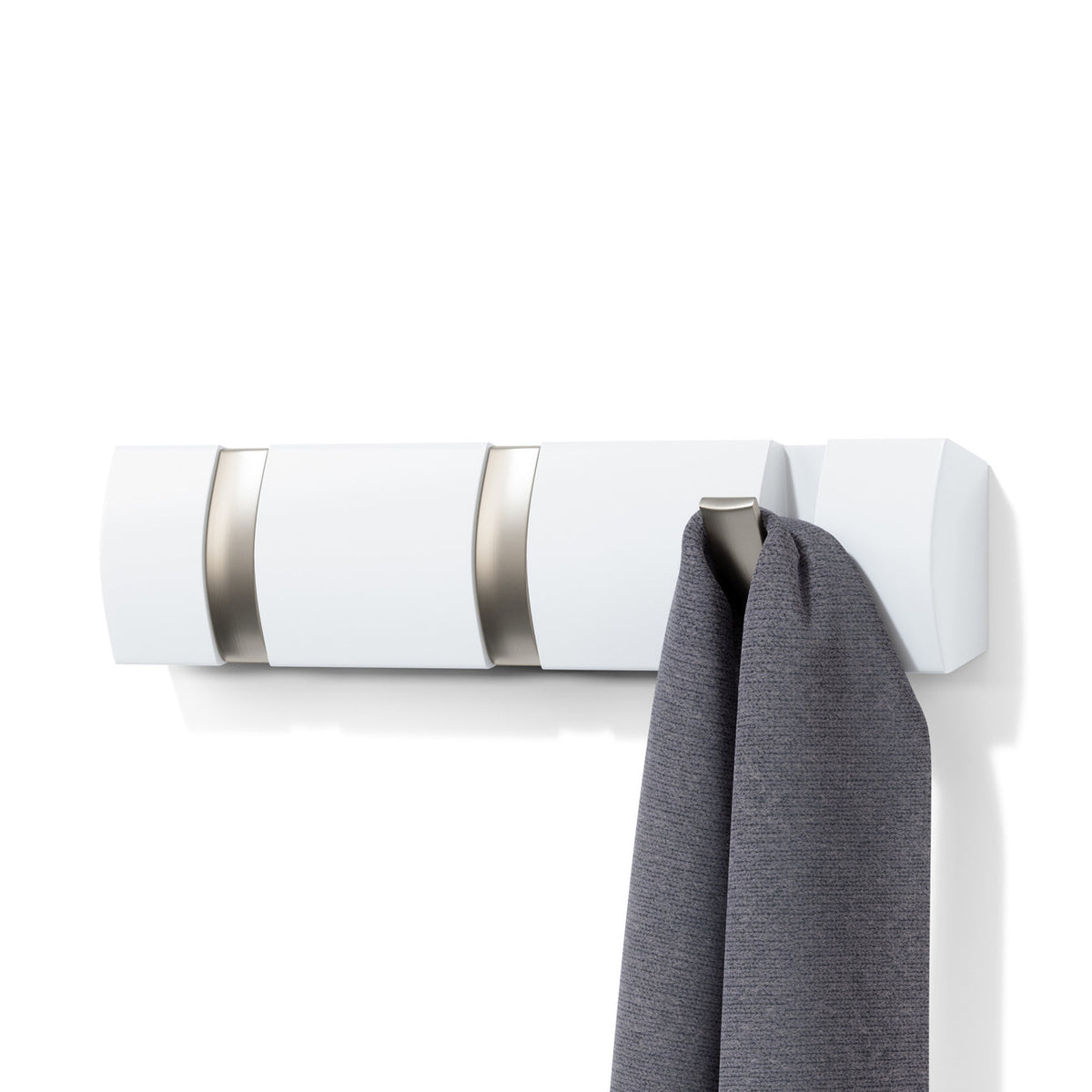 White Umbra Flip 3 hook rack with one hook folded down holding a grey scarf