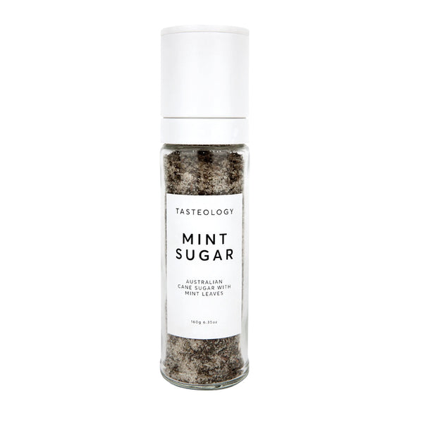 A bottle of Tasteology Mint Cane Sugar made with sustainable cane sugar on a white background.