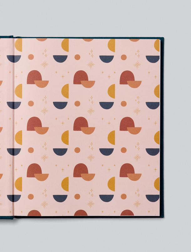 Illustrated endpapers with a geometric pattern in pink, rust and navy