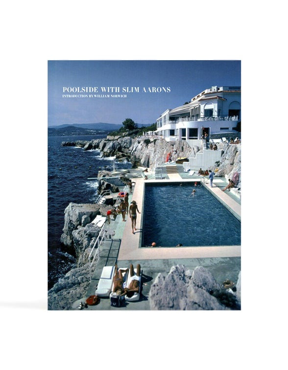 Poolside with Slim Aarons book cover, a clifftop swimming pool beside the sea below a white villa