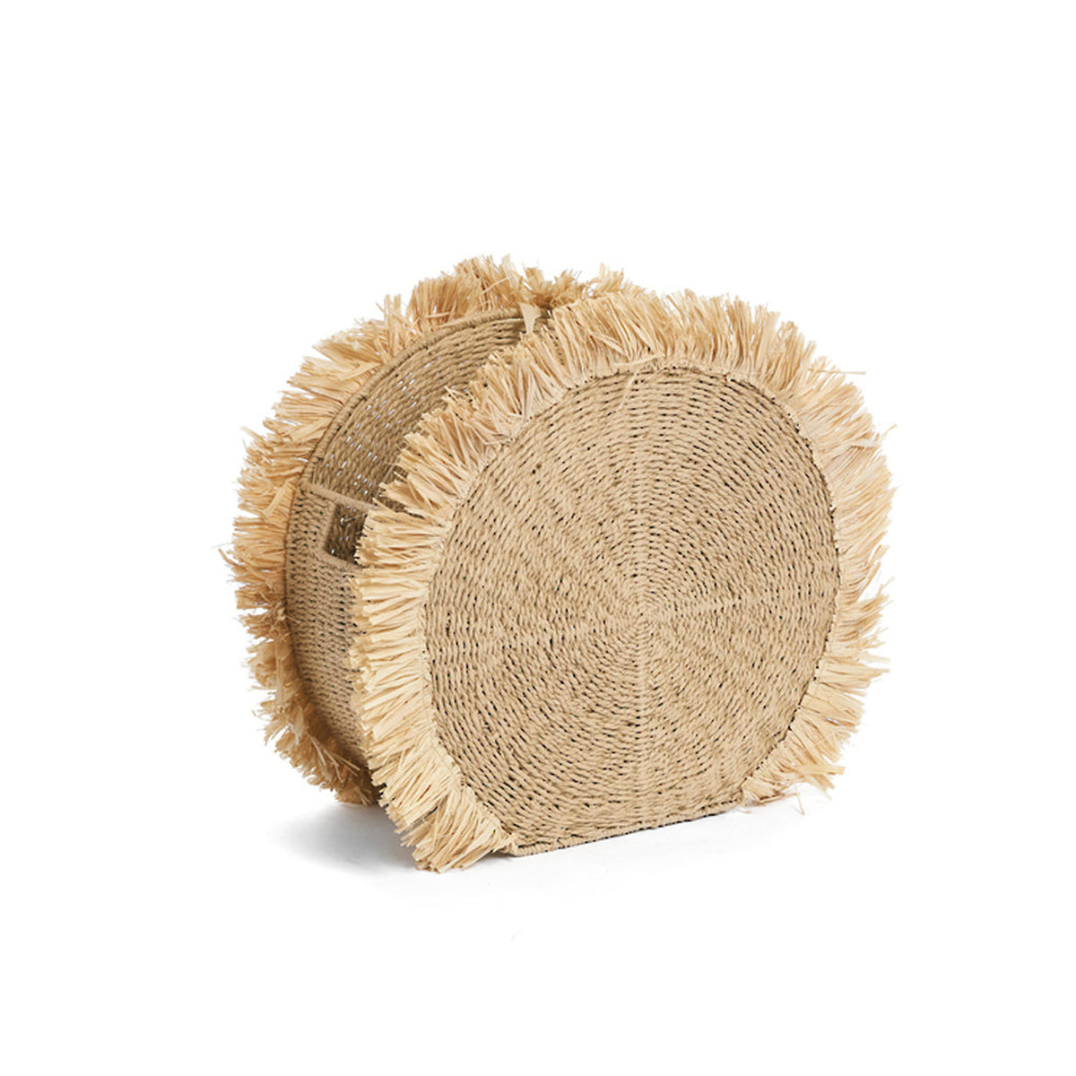 Large round raffia basket in natural straw with a fringed edge around the face