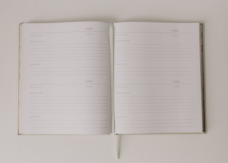 An Olive + Page - Hold The Moments Journal is open on a white surface.
